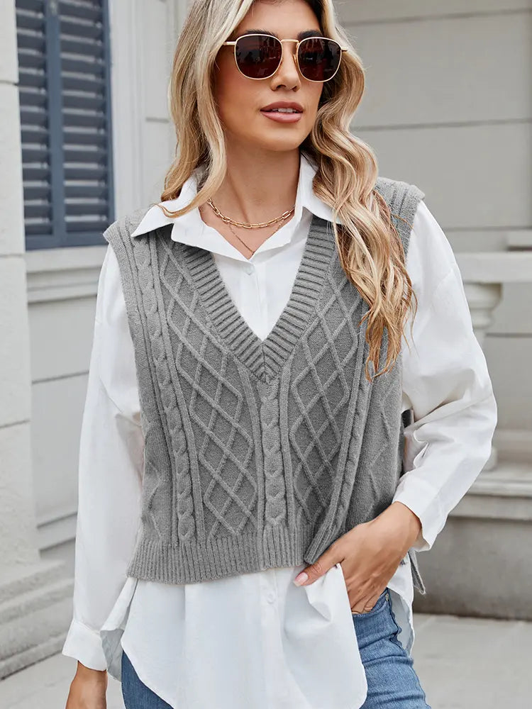 Front view of grey v-neck vest