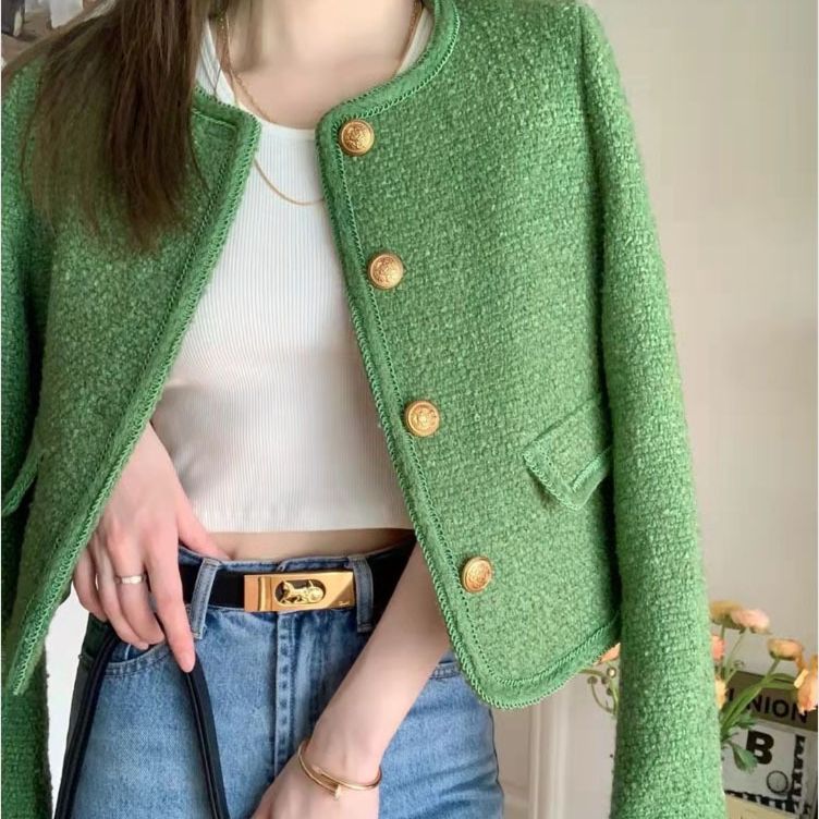 Back view of green tweed women's jacket